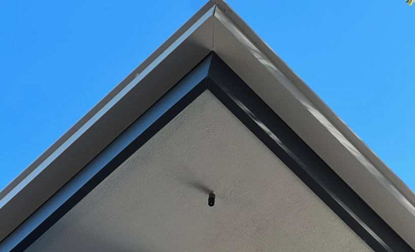 Eave spray wildfire sprinklers on a new home.